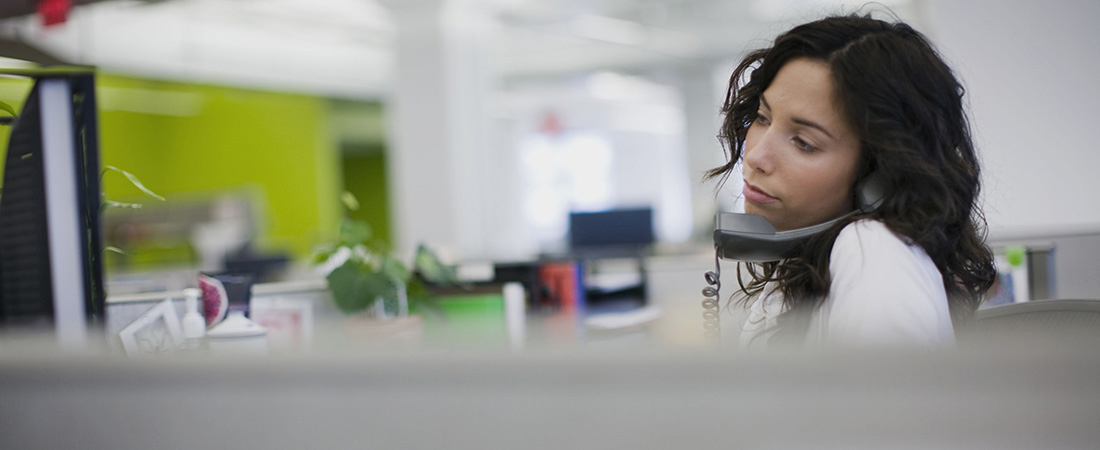 A picture of a reporter on the phone