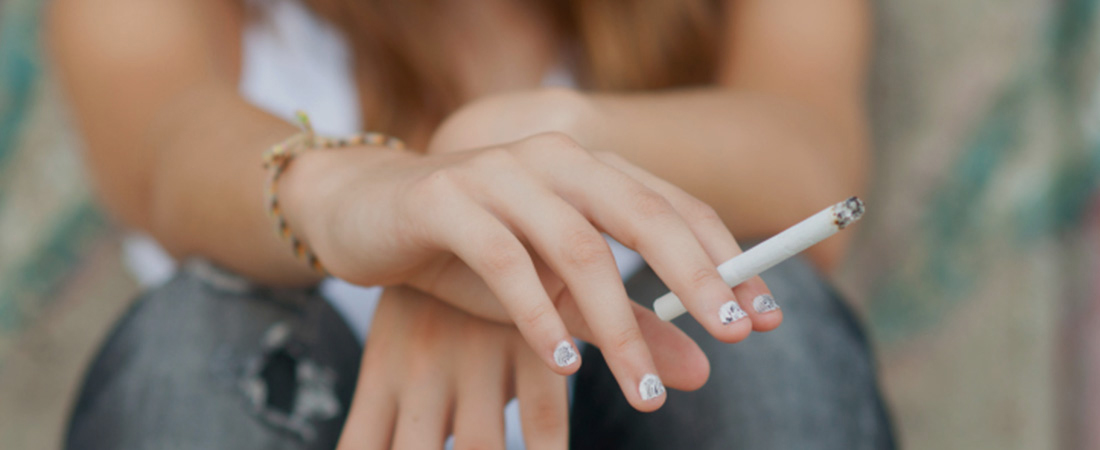 A young woman smoking