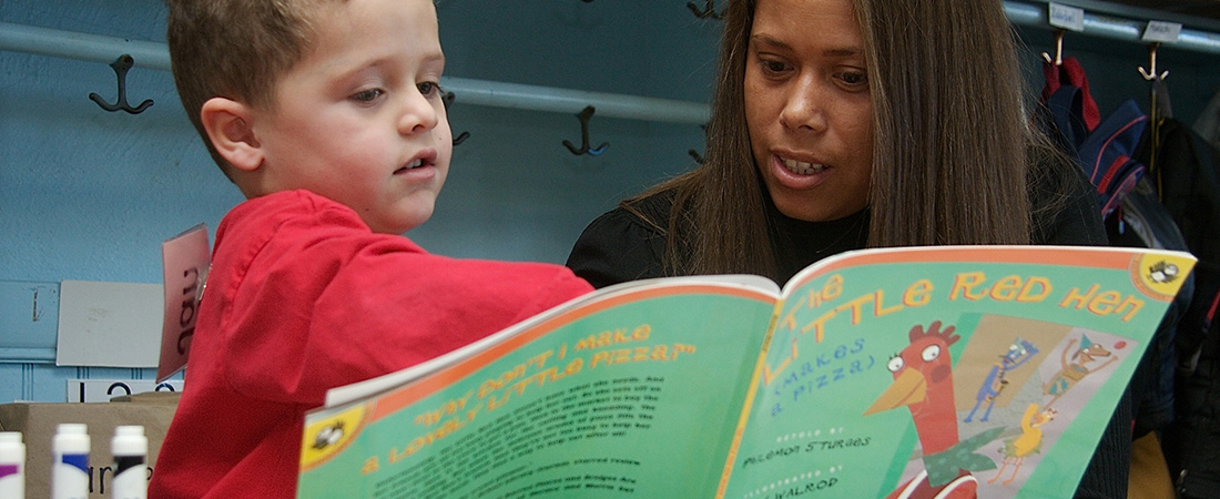 An educator with a young child