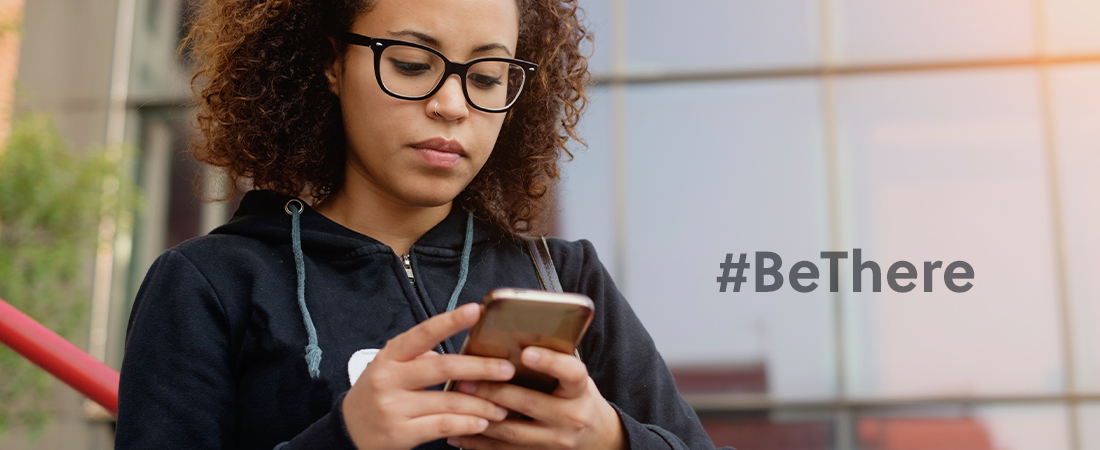 A photo of a woman on a phone representing 4 Things You Can Do to Prevent Suicide