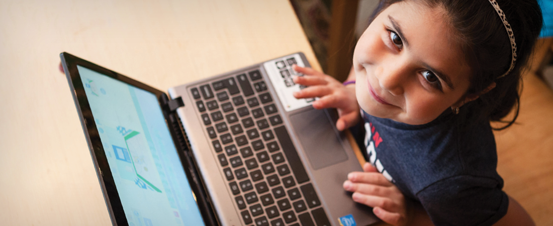 A child using a computer representing Four Resources for #CSEd Week