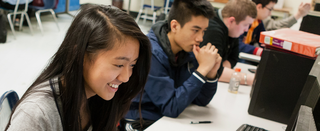 A photo of student using computer representing EDC Awarded Education Innovation Research Grant for Beauty & Joy of Computing