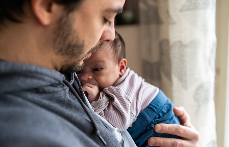 A photo of a father and child representing The Critical Role of Home Visiting in Recognizing and Addressing Paternal Depression