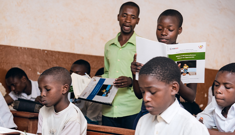 A classroom photo representing USAID/DRC Integrated Youth Development Activity (IYDA)