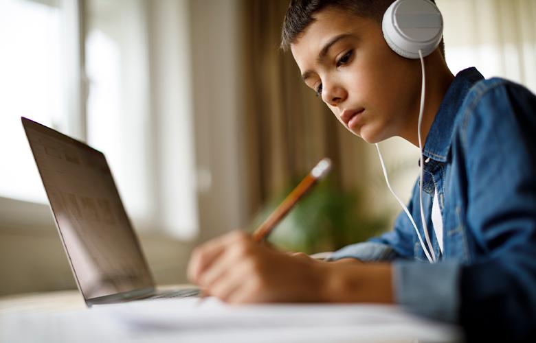 Student using a computer representing Digital Learning Day: Ways to Support Successful Online Learning