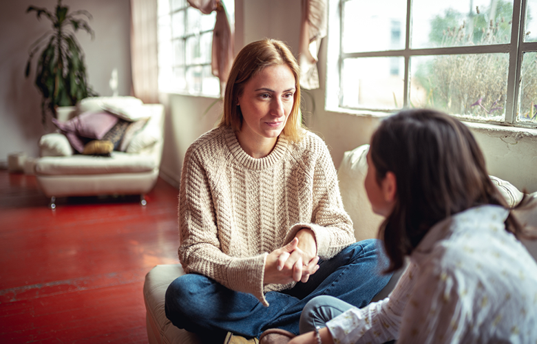 A photo of a parent and child representing 5 Ways to Help Children Cope with Coronavirus Anxiety