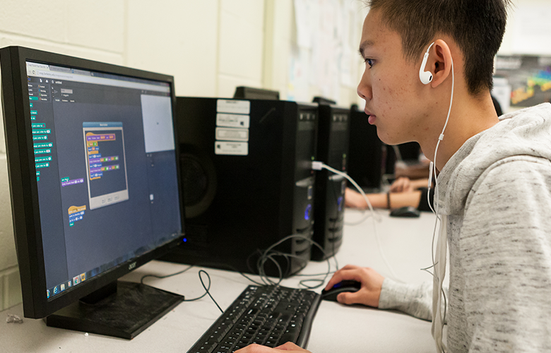 A photo of a student using a computer representing How Can We Support Computational Thinking in Schools? 