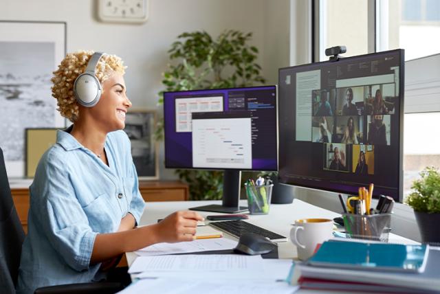 A woman on video call representing From Strangers to Colleagues: Cultivating an Effective Virtual Research Community