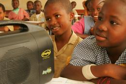 Students listening to an interactive radio instruction lesson