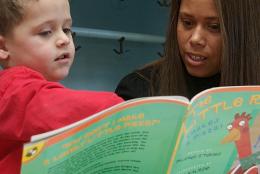 An educator with a young child