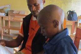 Reading together in a Rwandan classroom