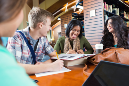 A photo of teacher and students representing Using Data to Strengthen Your High-Dosage Tutoring Program